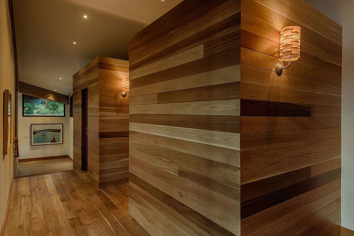 Оформление стен ламинатом в интерьере спальни, гостиной, прихожей, коридора и кухни