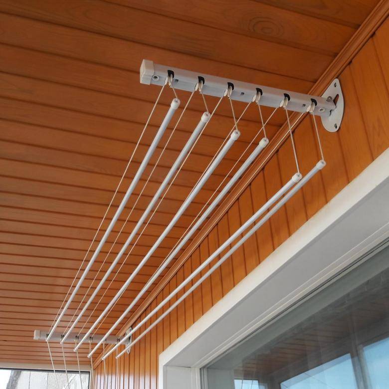 Потолочная сушилка для белья на балкон: лиана и другие виды