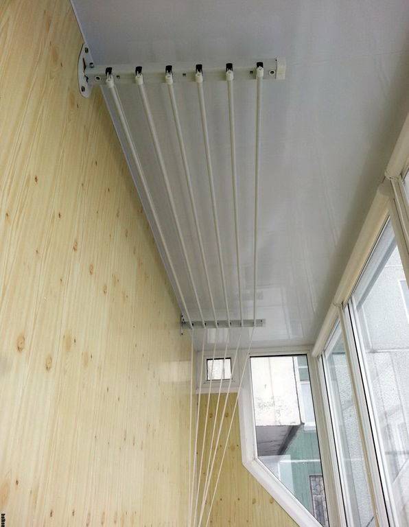 Потолочная сушилка для белья на балкон типа «лиана» — как выбрать идеальный вариант и установить его своими силами